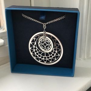 Stunning Revolving Silver Necklace and Earring Set